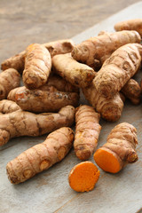 preparing fresh turmeric root