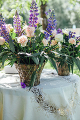 Wedding bouquets on a table with a white tablecloth