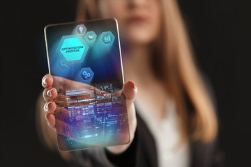 The concept of business, technology, the Internet and the network. A young entrepreneur working on a virtual screen of the future and sees the inscription: Optimization process