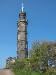 Fototapeta na wymiar View of Nelson Monument, a commemorative tower in Edinburgh, Scotland