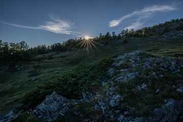 Fototapeta na wymiar Sonne Stern Landschaft Berg