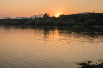 Fototapeta na wymiar sunset over slovakian lake Liptovska Mara Liptov 