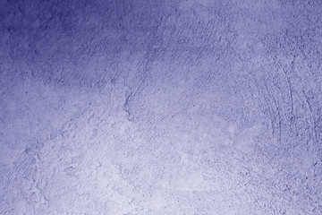 Grungy cement wall in blue color.