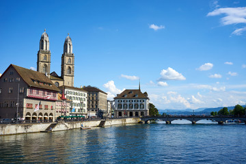 River "Limmat" in Zurich in Switzerland with Cathedral "Grossmunster" in the background