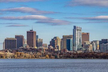 The Boston skyline and Charles River, seen from Cambridge with clouds, Massachusetts.