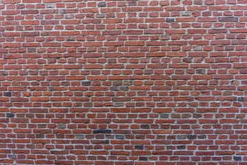 Fototapeta na wymiar Old grunge red brick wall texture background (empty)
