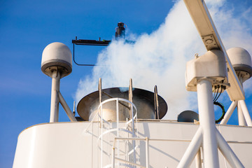 Elements of white ferry and blue sky, Norway
