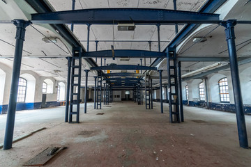 Interior of a large empty industrial warehouse