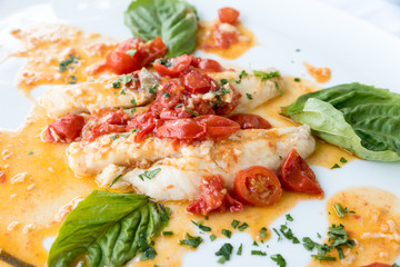 Cod with tomato and basil