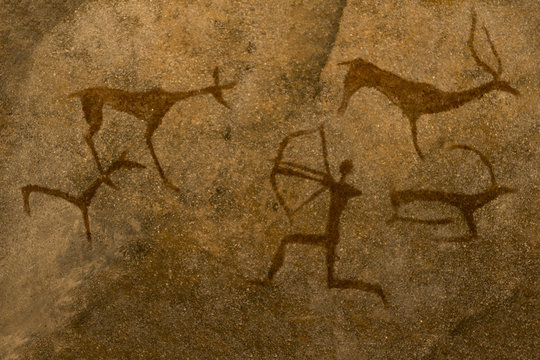An image of ancient animals painted by an ancient man on a cave wall. history, archeology.