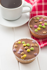 Sweet cupcakes with candies.