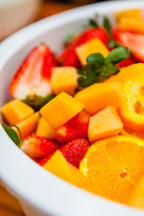 Fototapeta na wymiar Fresh Fruit Salad in a White Bowl
