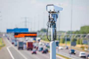 Surveillance camera in front of a Dutch highway