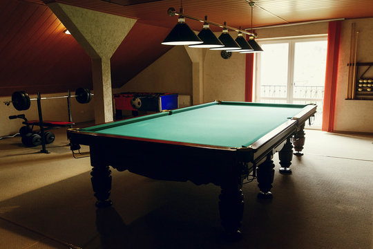 Luxury Pool Table At Recreation Room In Rehabilitation Centre In Hospital, Billiard Hobby Equipment Near Weight Lifting Station, Relaxing Sports Game Concept