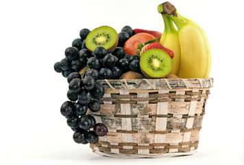 A lot kind of mixed fruits in basket on white  background.