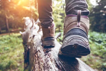 Fotobehang a hiking boots © Sergii Mostovyi