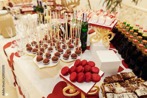Stylish Candy Bar With Sweets And Drinks At Luxury Wedding Reception Stylish Candy Bar With Sweets And Drinks At Luxury Wedding Reception Catering Restaurant