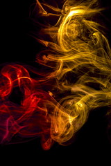 Colored smoke on black background