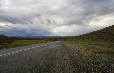 foggy mystical asphalt road