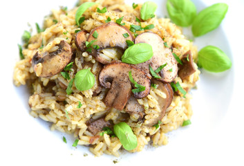 Mushroom Risotto on white dish..Rice menu with vegetable.