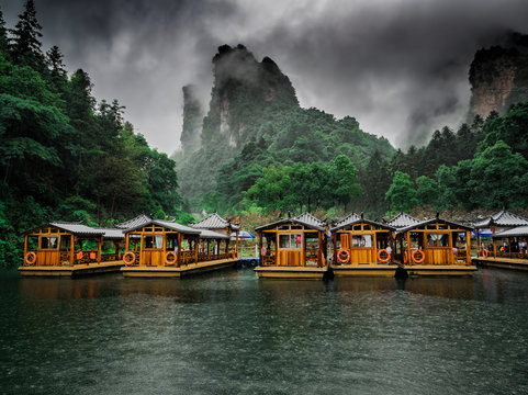 Baofeng Lake Boat Trip in a rainy day with clouds and mist at Wulingyuan, Zhangjiajie National Forest Park, Hunan Province, China, Asia