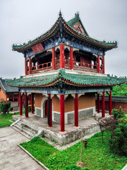 Buddhist Temple with colorful decorative details at the top of the Tianmen Mountain, Hunan Province, Zhangjiajie, China