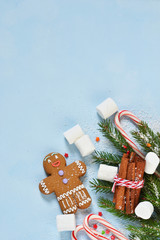 New Year's blue background with ginger biscuits, sweets and sweets. Happy New Year and Merry Christmas.