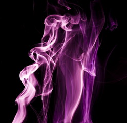 Purple smoke on black background