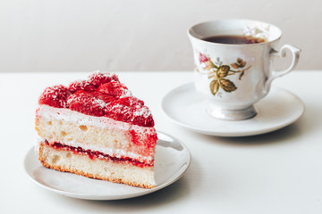 Strawberry sweet dessert in a plate close up on a white background