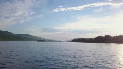 Flight over water surface river Enisey in Krasnoyarsk city day drone footage