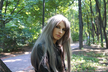 Portrait of girl with long hair in park