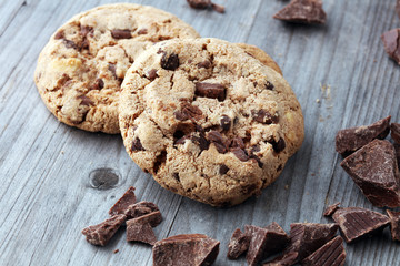 Chocolate cookies on wooden table. Chocolate chip cookies shot.