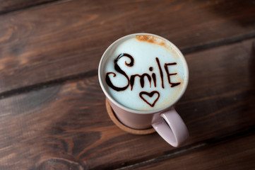 cup of coffee on the table, smile