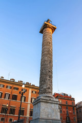 Fototapeta premium View on the ancient ruins of Marco Aurelio in Piazza Colonna Rome, Italy on a sunny day.