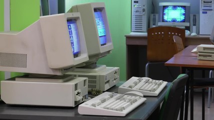 A antique working device. Very old computer counting the number of PI. Retro style.  Panning. Closeup.