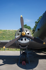 A fragment of an old transport aircraft. Engine with propeller