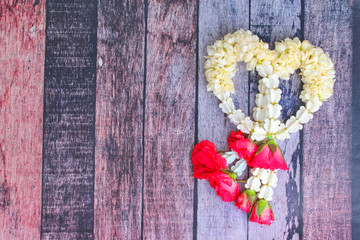 Isolated of  garland,lei of flowers,to worship of the virtues with  red rose and white crown flower