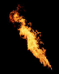 Long narrow flame isolated on black, dragon breath