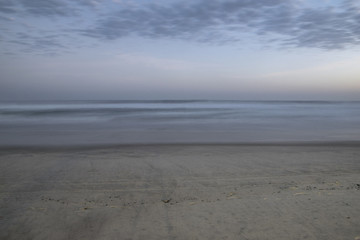 Beach colorful sunset long exposure