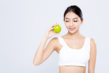 Portrait asian woman smiling holding green apple fruit and beautiful body diet with fit isolated on white background, girl weight slim with cellulite or calories, health and wellness concept.