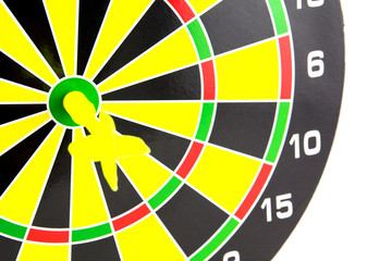 Setting goal or accurate planning, hand going to take dart into the center of dartboard