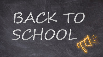 back to school text on blackboard with megaphone