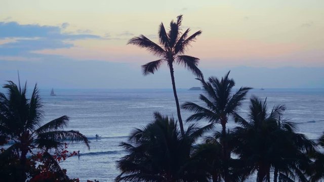 Colorful sunset in Waikiki beach Hawaii in 4k slow motion 60fps