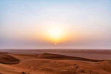 Fototapeta na wymiar Wahiba Sands at sunrise in Oman.