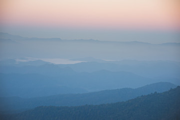 Fototapeta premium Beautiful seen of sun raise in early morning with sierra and fog of sea.
