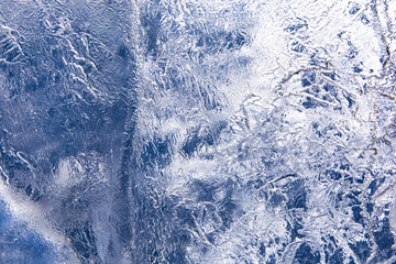 The texture of the ice. The frozen water.Winter background    