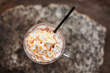 Top View of hot chocolate or coffee drink with whipped cream
