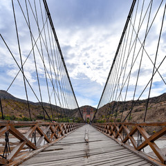 Puente Sucre (or Puente Mendes), an old suspension bridge built in 1890 spanning the Rio Pilcomayo in the Chuquisaca Department of Bolivia.