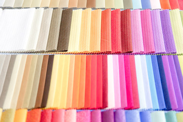 Rolls of fabric and textiles in a shop or store