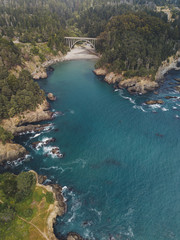 Obraz premium Aerial Drone Shot Russian Gulch National Park Bridge Sea Forest Sky